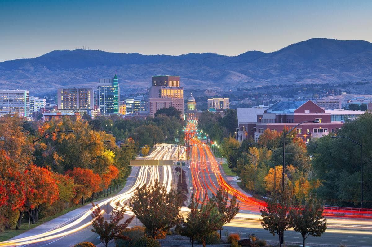 Downtown Boise, the Idaho State Capitol, and the Boise Foothills at dusk