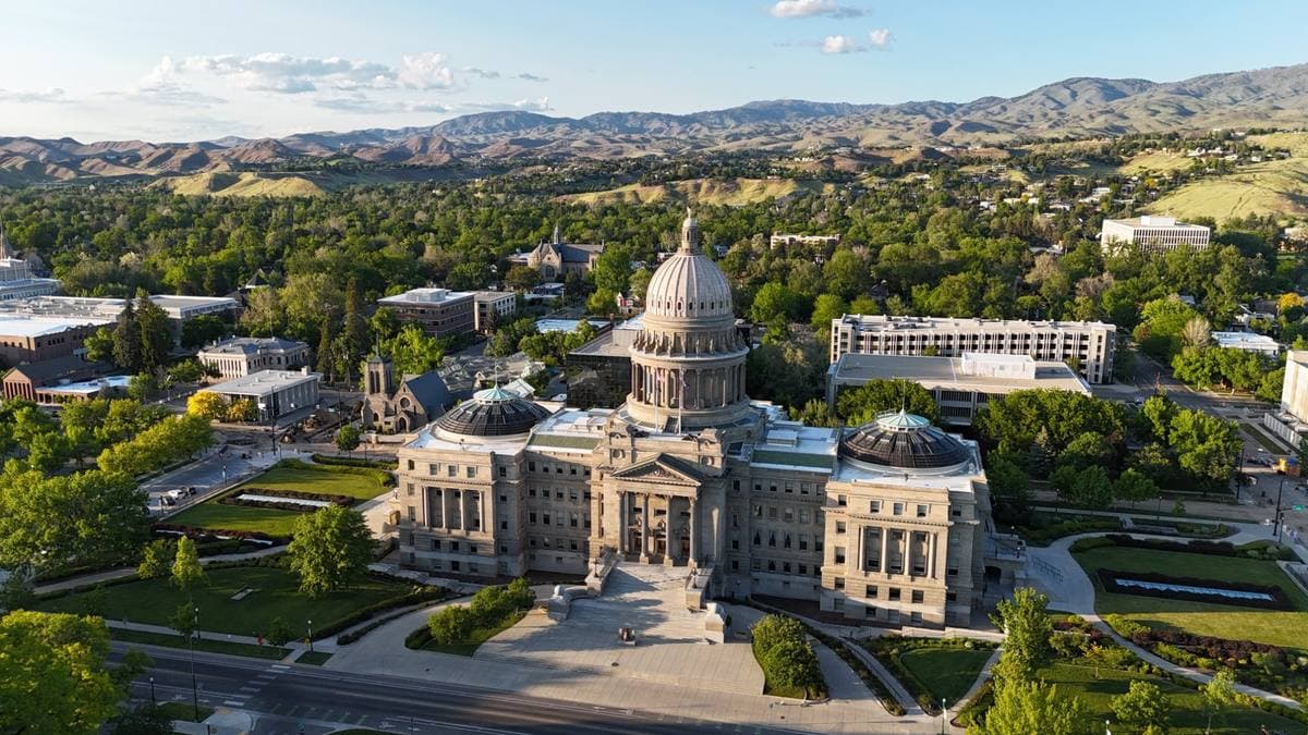 Aerial view of the Idaho State Capitol and Boise Foothills